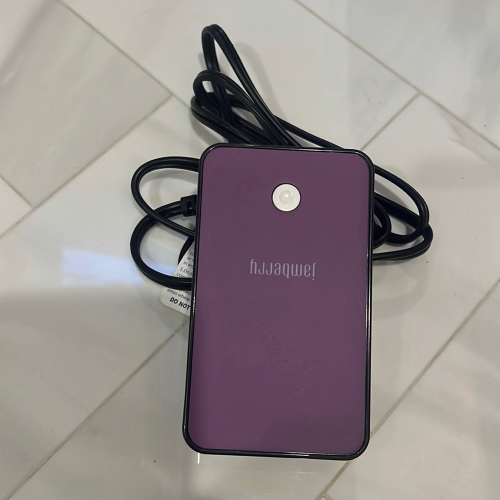 Jamberry Mini Heater, storage bag, and multiple sheets of wraps (partially used)